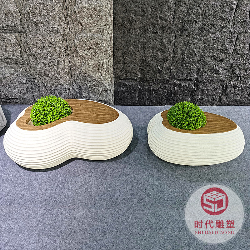 玻璃鋼鵝卵石休閑座椅軟包沙發(fā)現(xiàn)代美陳室內(nèi)裝飾商場(chǎng)造型石頭坐凳